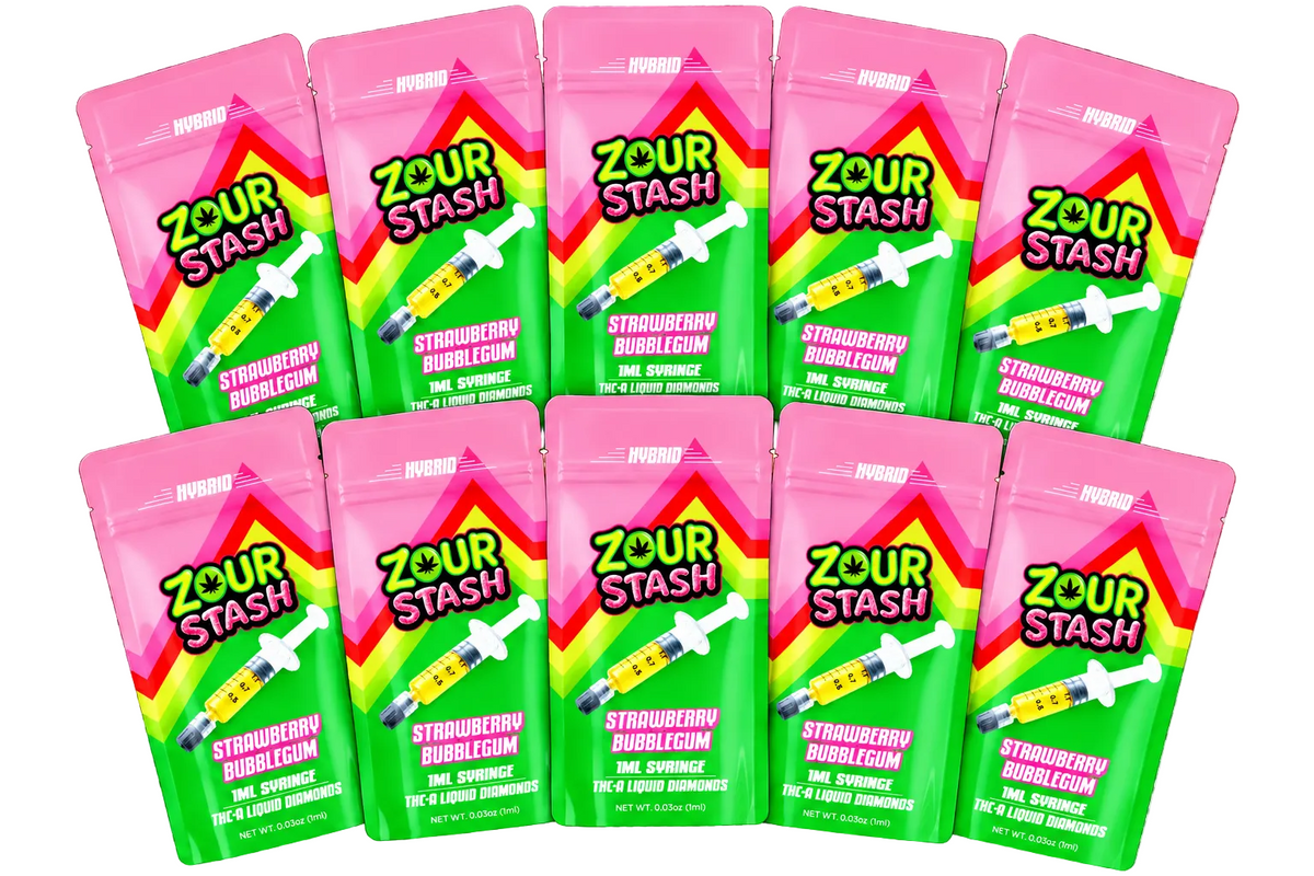 Ten pouches of Zour Stash Strawberry Bubblegum gum are arranged in two rows on a transparent/white checkered background. The packaging features a bright pink top half and a green bottom half with a diagonal rainbow stripe, and an illustration of a syringe.